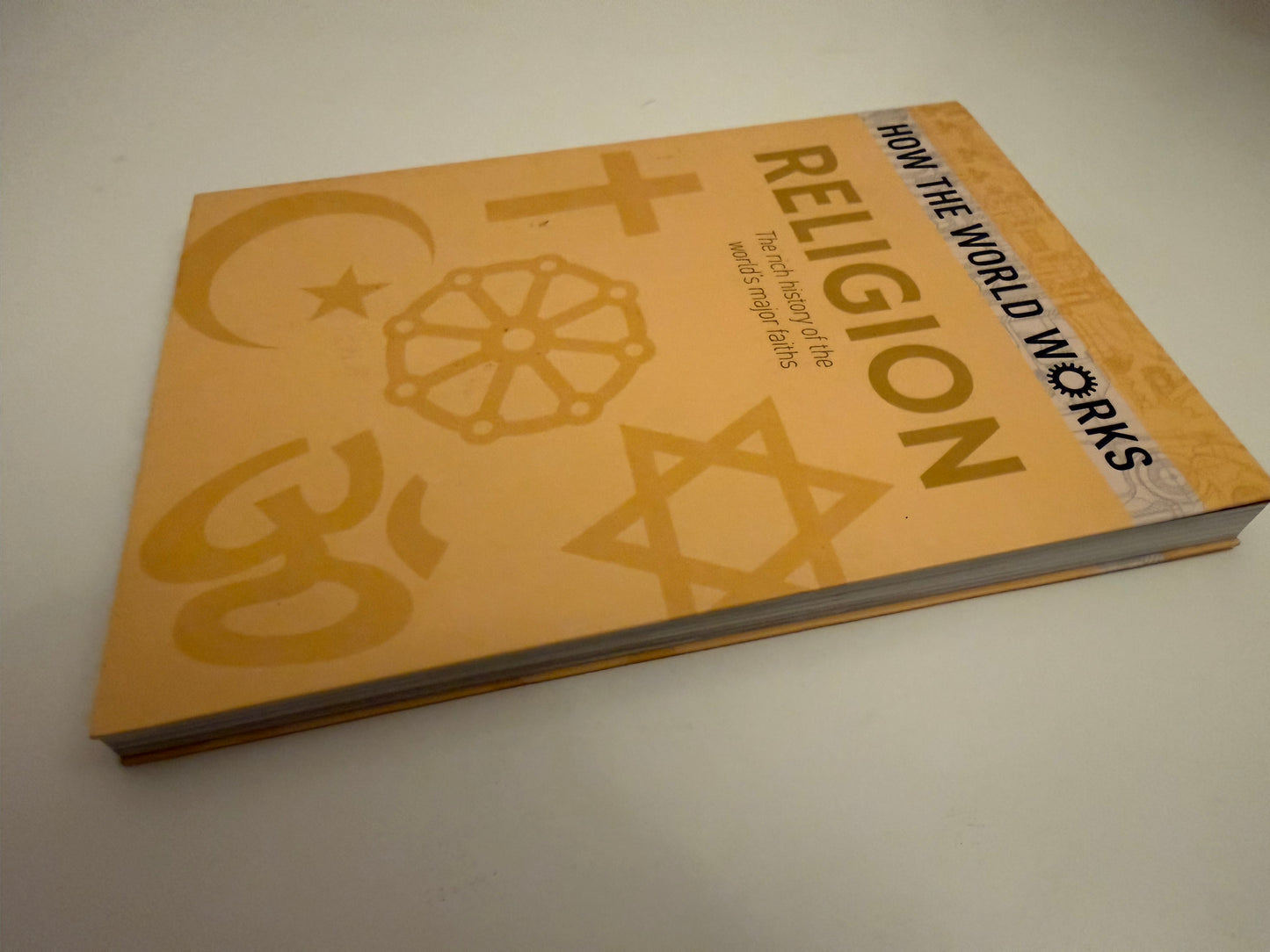 How the World Works: Religion: The rich history of the worlds major faiths by John Hawkins (book)