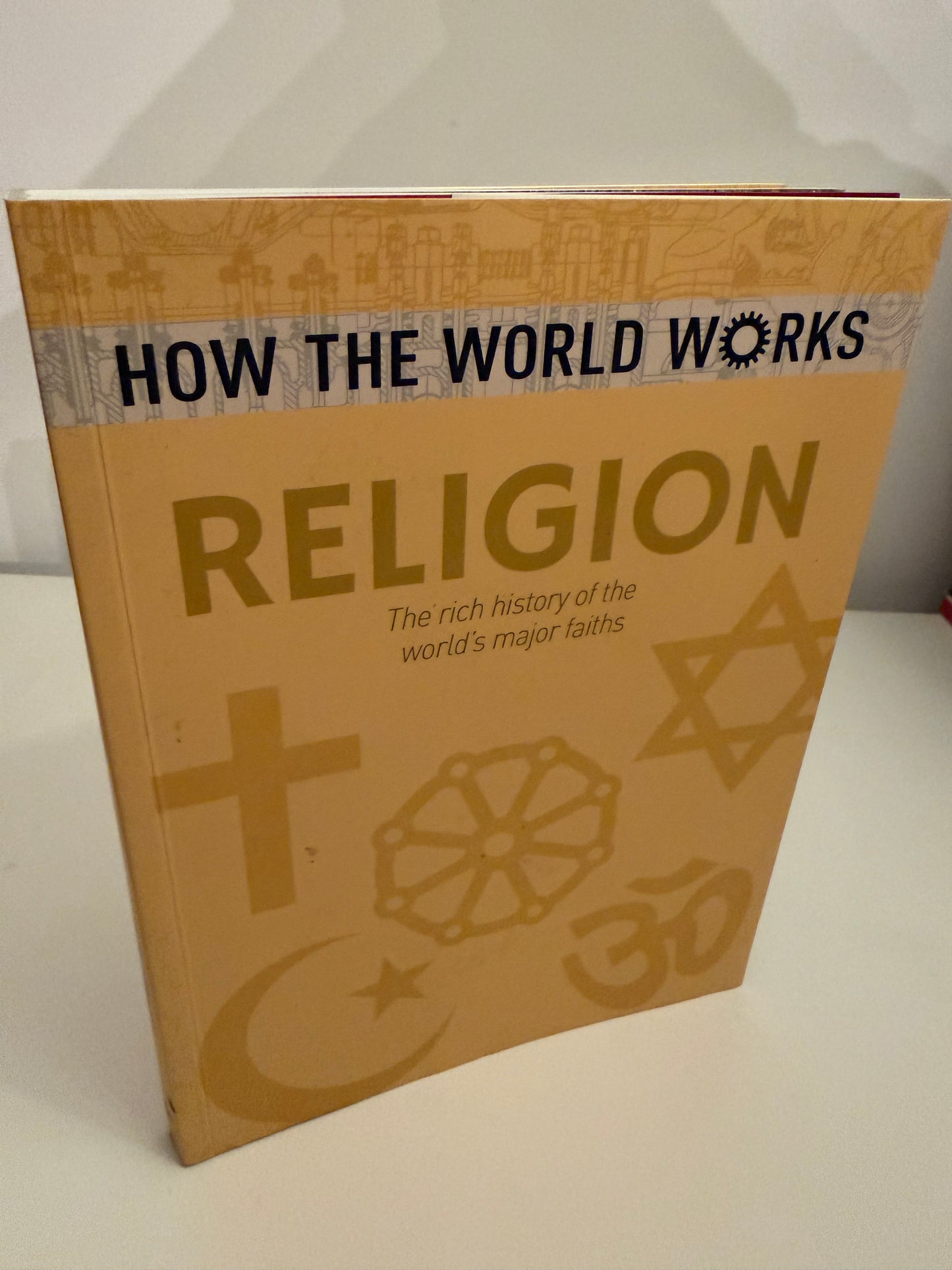How the World Works: Religion: The rich history of the worlds major faiths by John Hawkins (book)