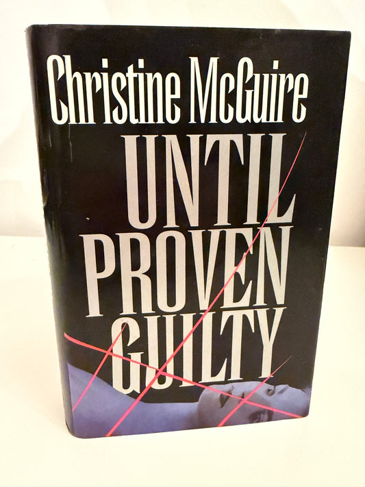 Until Proven Guilty CHRISTINE McGUIRE 1st Reprint (hardback book)