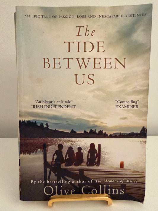 The Tide Between Us by Olive Collins (paperback book)