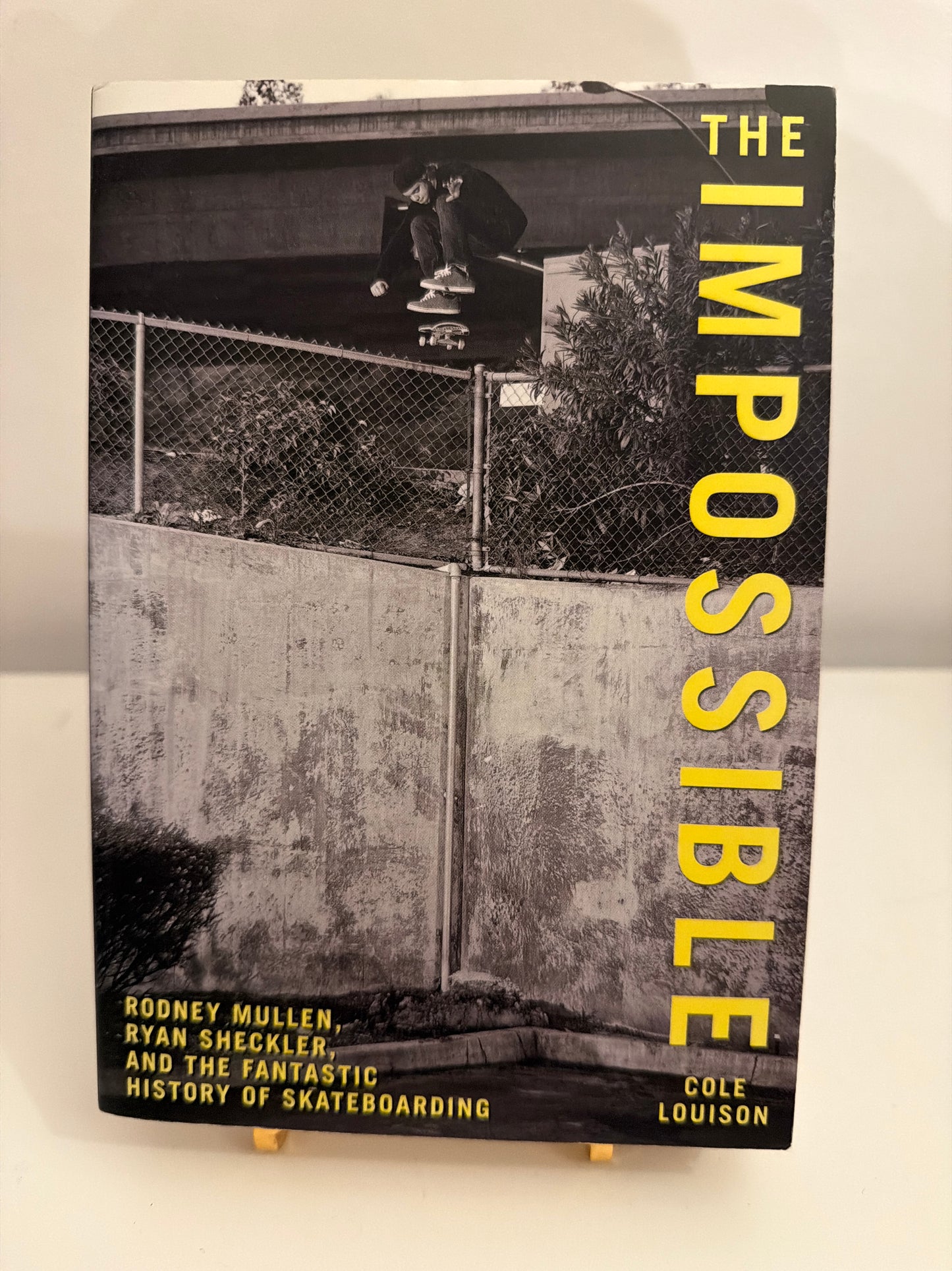 The Impossible: Rodney Mullen, Ryan Sheckler, and the Fantastic History of Skateboarding by Cole Louison (paperback book)